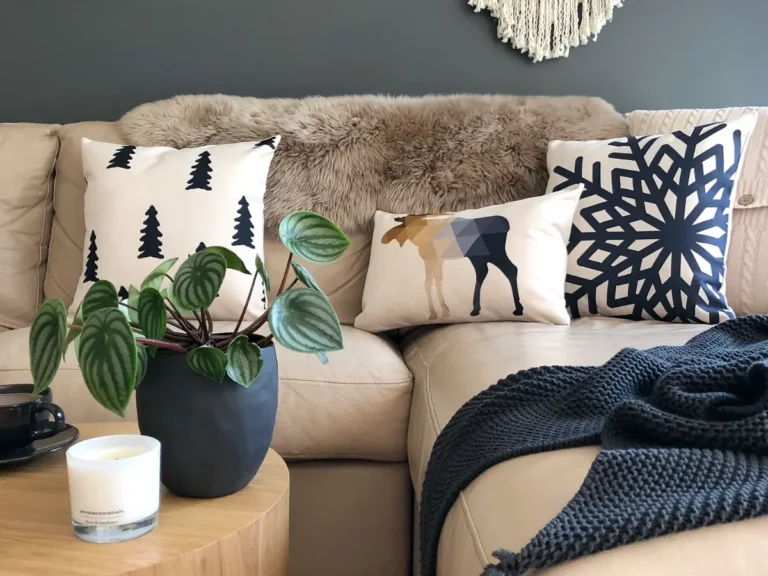 Living room with beige sofa and Scandi styled cushions set up against a fur throw