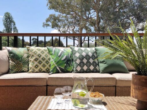 green outdoor cushion covers in outdoor setting