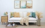 Yellow and teal Juno cushion range styled in a coastal themed room
