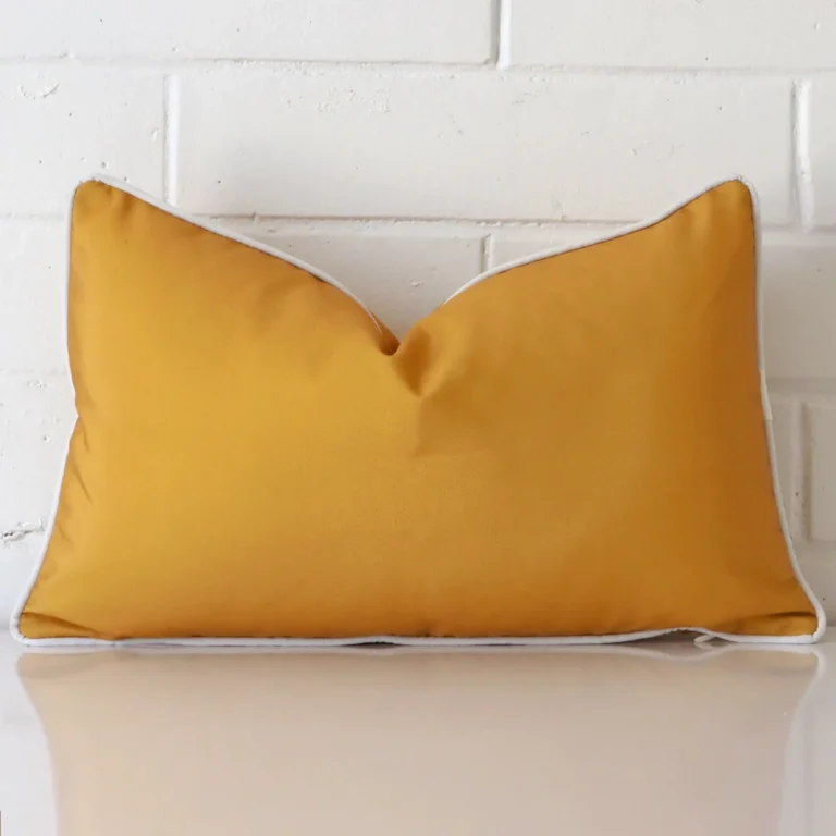 Vibrant outdoor cushion cover in a stylish rectangle size with mustard colouring.