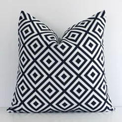 Striking square black-and-white cushion cover featuring a geometric style on quality outdoor fabric.