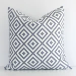 A gorgeous outdoor square cushion in grey. It has an eye-catching geometric design.