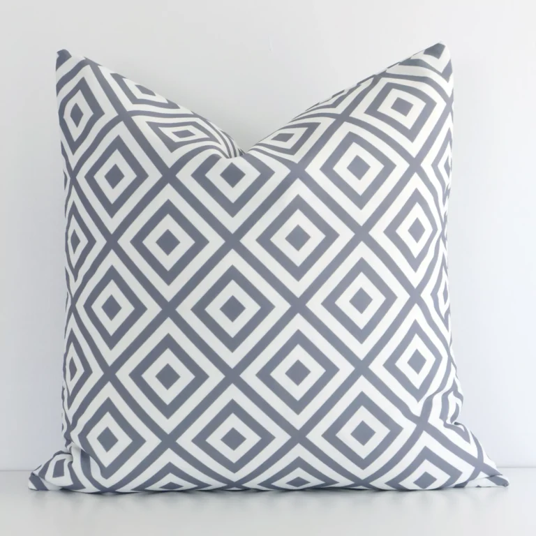 A gorgeous outdoor square cushion in grey. It has an eye-catching geometric design.