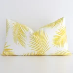 A superior outdoor yellow cushion cover yielding a palm style and in a classy rectangle size.