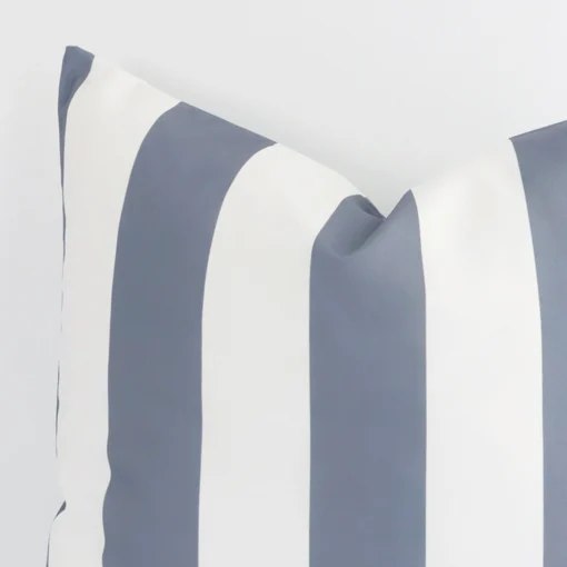 A close up image of this striped large cushion. The image shows details of its outdoor fabric and grey colour.