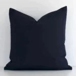 Lovely black solid-coloured cushion made from outdoor fabric and in an elegant square shape.