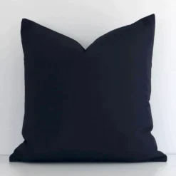 Lovely black solid-coloured cushion made from outdoor fabric and in an elegant square shape.