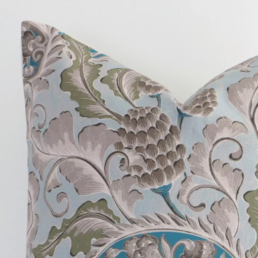 Macro image of a linen square cushion cover. The shot shows the colourful hue and patterned style more thoroughly.