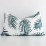 Gorgeous outdoor rectangle cushion in a green colour. It has a charming palm style.