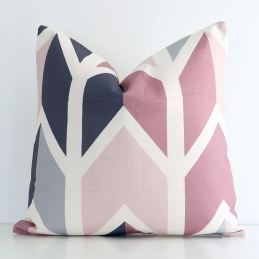 A gorgeous linen square cushion in colourful print. It has an eye-catching geometric design.