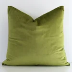 Lovely olive green solid-coloured cushion made from velvet fabric and in an elegant square shape.