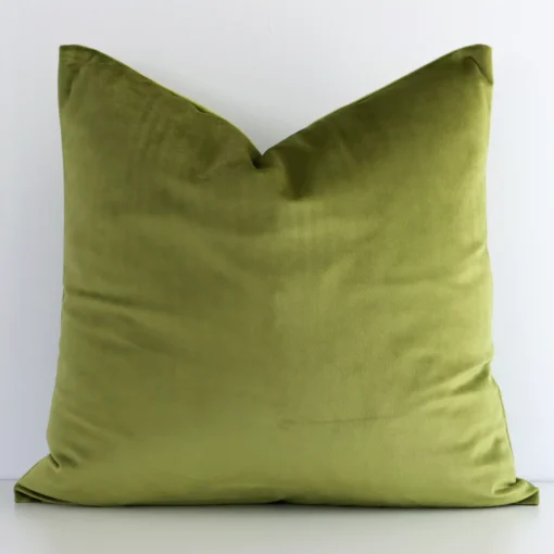 Lovely olive green solid-coloured cushion made from velvet fabric and in an elegant square shape.