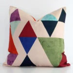 A premium linen colourful cushion boasting a geometric design and in a square size.
