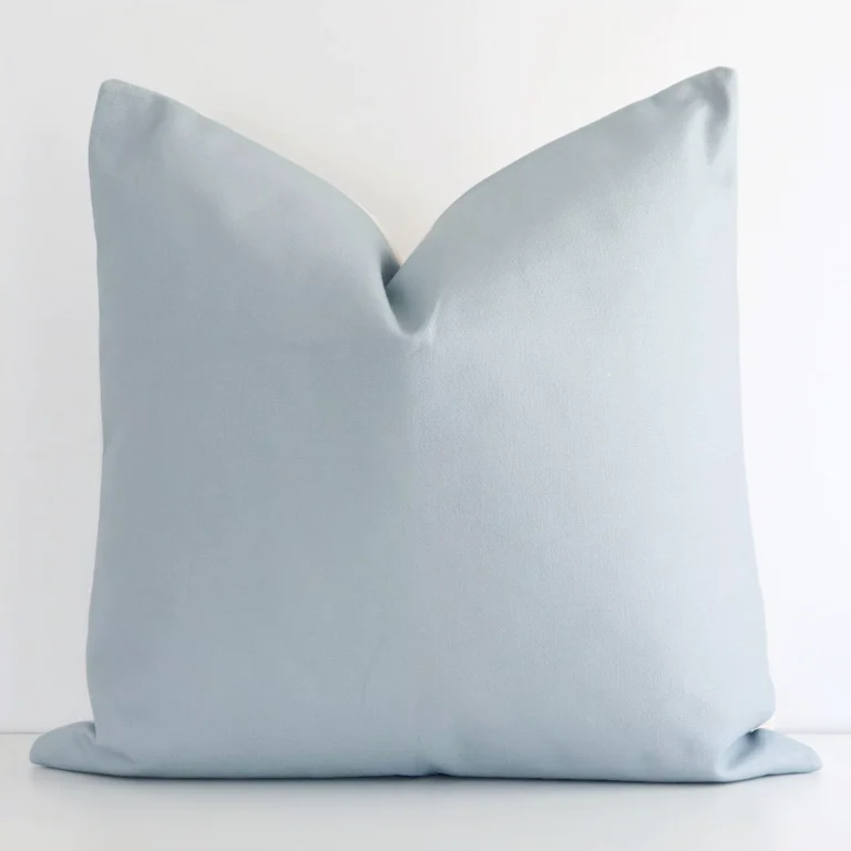 Gorgeous large linen cushion cover that has a soft teal hue. It has a graceful solid colour design.