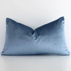 A graceful rectangle stone blue cushion with a solid colour style on durable velvet fabric.