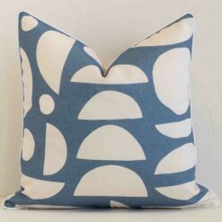 Gorgeous square outdoor cushion cover that has a blue hue. It has a graceful geometric design.