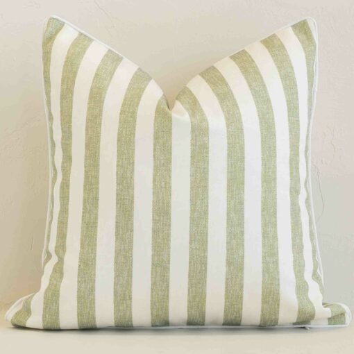 Sage stripe cushion cover sits against a white wall. It is constructed from a superior looking outdoor material and has square dimensions.