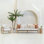 A white sofa is styled with a set of 7 outdoor sofa cushions in desert boom colour.