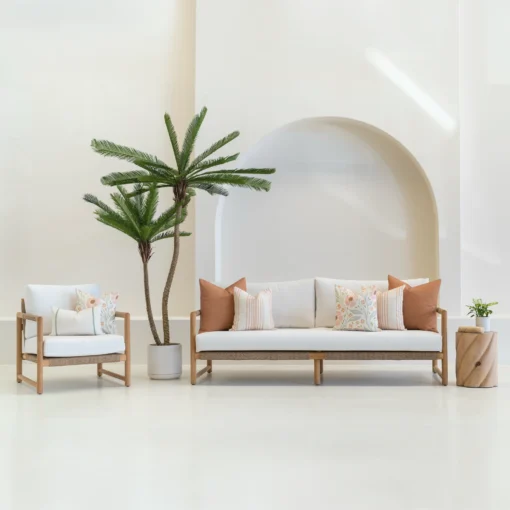 A white sofa is styled with a set of 7 outdoor sofa cushions in desert boom colour.
