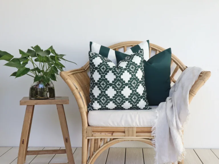 An example of how to choose outdoor cushions done right with an attractive set of green designs on a chair.