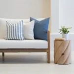 Outdoor living room with a set of 3 pacific cove outdoor couch cushions on it.