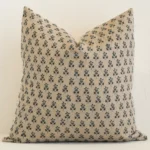 An eye-catching linen large cushion cover featuring a sand hue. It has a unique floral style.