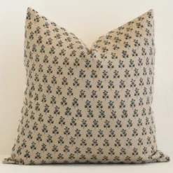 An eye-catching linen large cushion cover featuring a sand hue. It has a unique floral style.