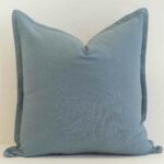 Dusty blue linen cushion cover with a calm, muted hue and tailored finish.