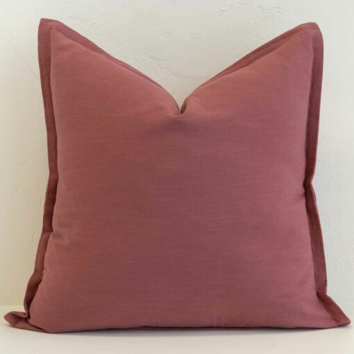 Dusty pink linen cushion cover with a warm, understated blush tone and soft structure.