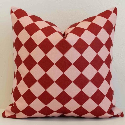 Diamond gingham cushion cover with a classic check design in rich red and soft blush.