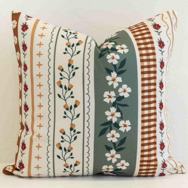 Floral stripe cushion cover combining delicate florals, gingham and stripes in a layered, vintage-inspired design.