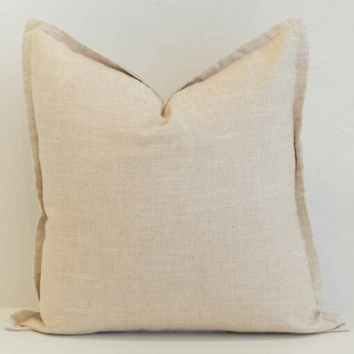 Oatmeal linen cushion cover in a soft, neutral tone with a subtle, organic texture.