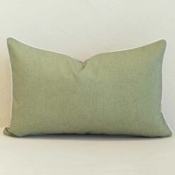 Pacific sage rectangular cushion with subtle textured fabric and white piping.