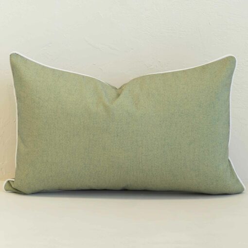 Pacific sage rectangular cushion with subtle textured fabric and white piping.