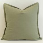 Sage linen cushion cover in a muted green tone, bringing a calm and grounded feel to your space.