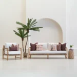 Solterra cushions set on outdoor sofa with brown and patterned designs.