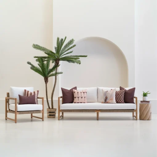 Solterra cushions set on outdoor sofa with brown and patterned designs.