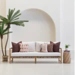 Solterra cushions set with neutral and geometric patterns on outdoor sofa.