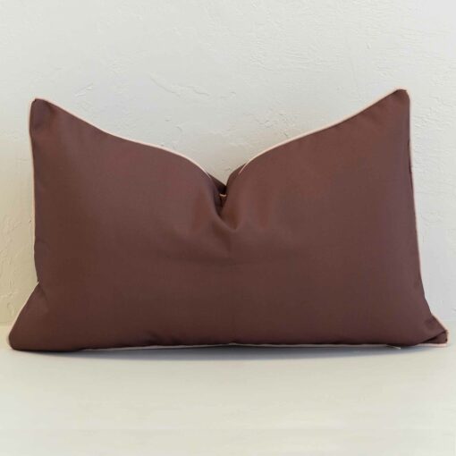 Rectangular outdoor cushion cover in deep brown, designed for a clean, understated look that pairs effortlessly with patterned styles.