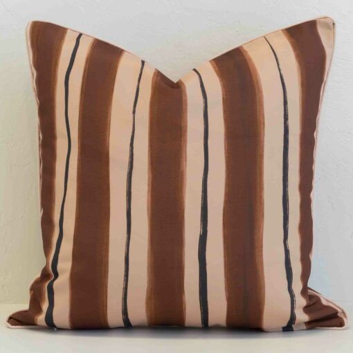 Solterra striped cushion with brown, beige and thin dark vertical lines.