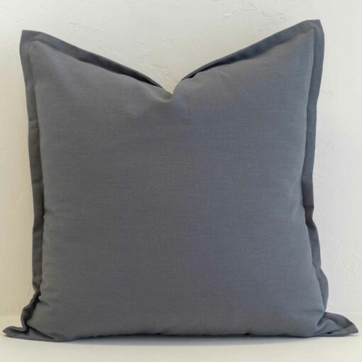 Steel blue linen cushion cover in a deeper muted shade, offering a calm and refined look.