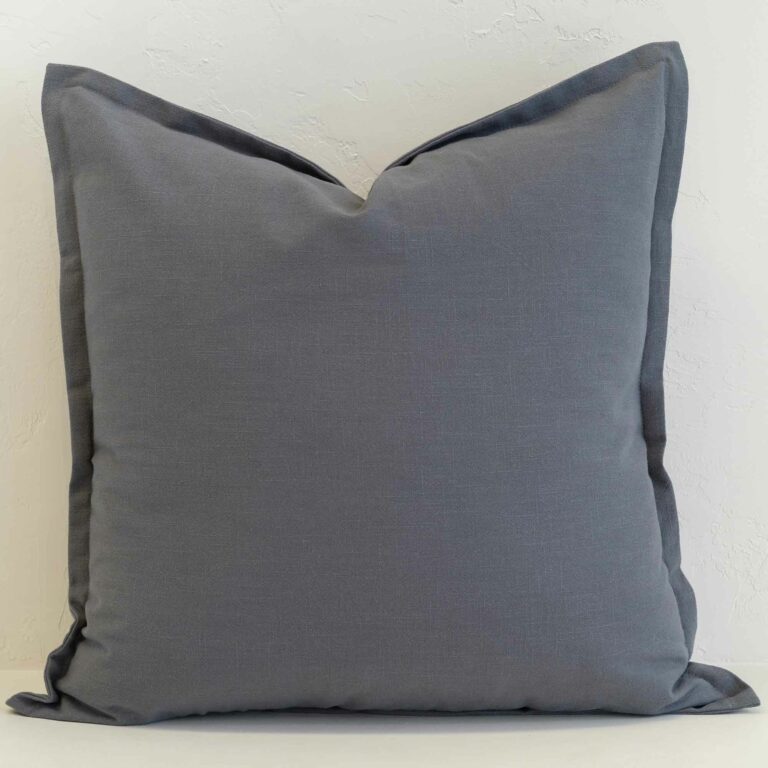 Steel blue linen cushion cover in a deeper muted shade, offering a calm and refined look.